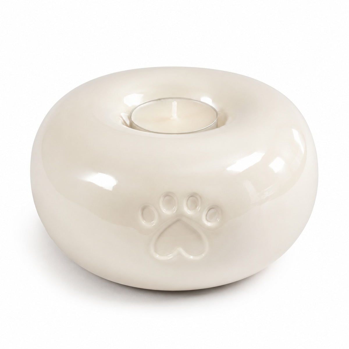 Ronde urn hond of kat in beige, detail pootafdruk en waxinelicht