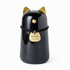 De laatste aai zwarte keramieken kattenurn met gouden oren en een gepersonaliseerde naamhanger voor asbewaring.