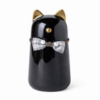 De laatste aai zwarte keramieken kattenurn met gouden oortjes en een decoratief strikje voor asbewaring.